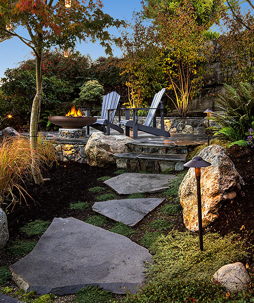 A photo of a landscaped patio and garden